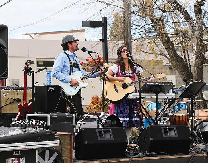 Dandelions (husband and wife duo Ben and Shilo Cameron) donned lederhosen and dirndl attire for their performance;