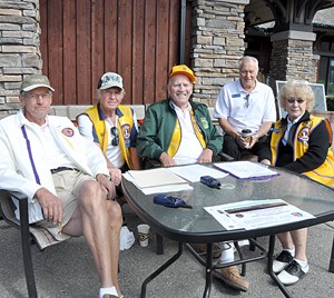 Windermere Lions Club members relaxing during 2010's Charity Golf Day.