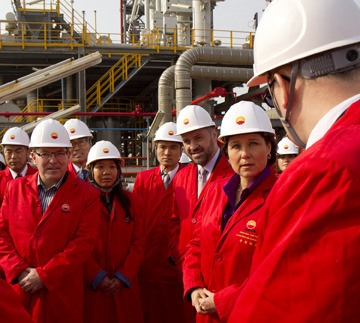 Premier Christy Clark and B.C.'s new trade commissioner Ben Stewart (left) tour LNG import facility in China.