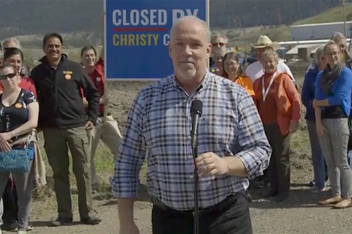 NDP leader John Horgan joins Fraser-Nicola candidate Harry Lali (left) at the site of the shut-down Tolko sawmill in Merritt.