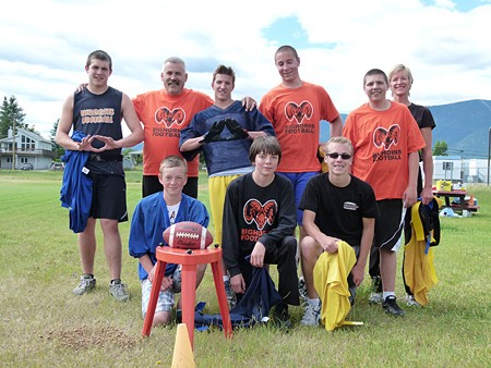 Flag football players enjoy a game at the field July 9.