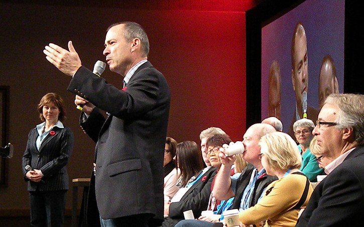 Premier Christy Clark listens as Agriculture Minister Norm Letnick addresses the B.C. Liberal Party convention in Vancouver