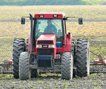 A farmer prepares his field in Delta. Debate has continued for decades about the agricultural land reserve's function outside B.C.'s main farming regions of the Okanagan and southwest