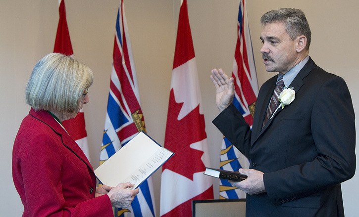 Lt. Governor Judith Guichon administers cabinet oath to Prince George-Mackenzie MLA Mike Morris