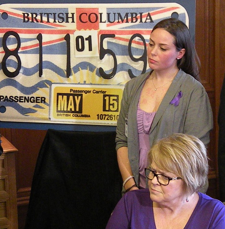 Danielle Raymond and her mother Julie attend announcement by Transportation Minister Todd Stone to increase regulation of party buses before this spring's high school graduation.