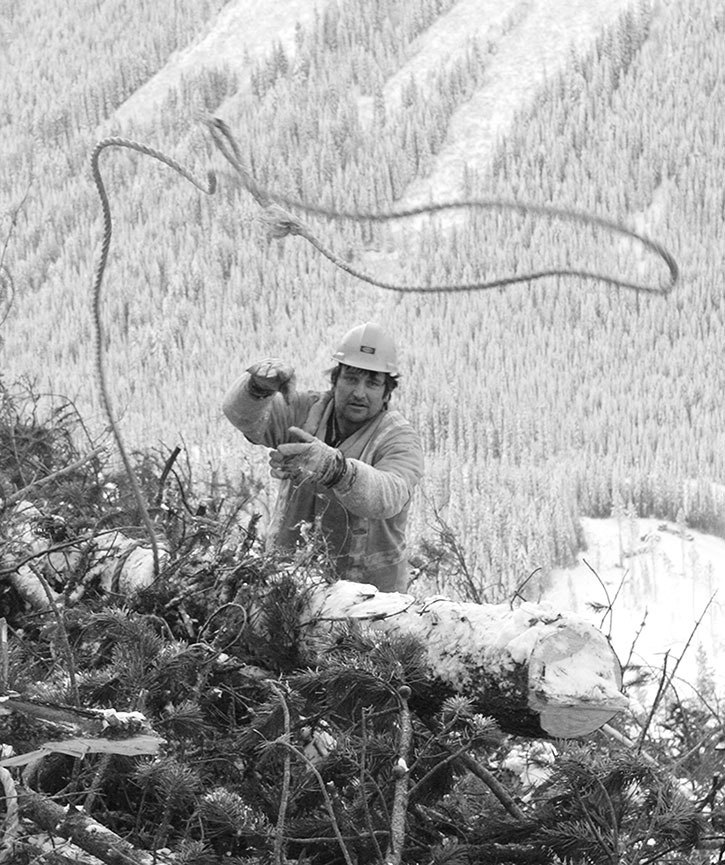 January 2007 — Ernie Parent throws a choker rope to a nearby log