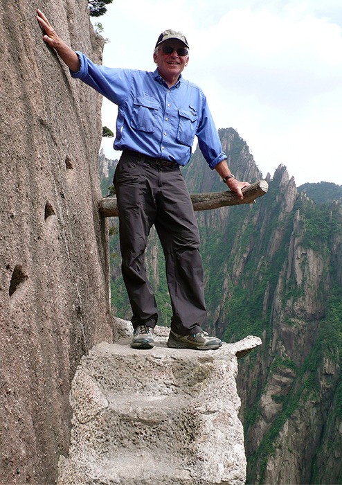 Jim Thorsell from Wilmer perched on one of Huangshan’s airy cliffside footpaths. He received his honourary Chinese citizenship at Huangshan in May.