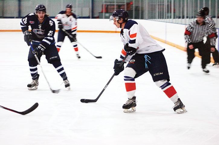 Rockies forward Harrison Davies handles the puck in the Rockies’ last game against Creston at the Eddie on Saturday