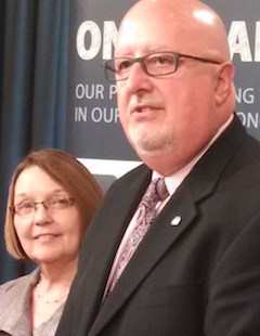 Jobs Minister Shirley Bond and Tom Sigurdson of the B.C. Building Trades announce deal on public construction at the B.C. legislature Tuesday.