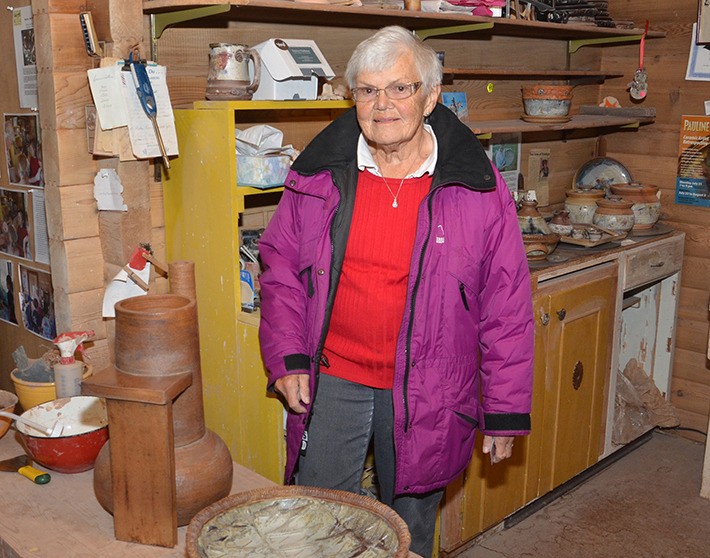 Invermere potter Pauline Newhouse uses her former vacation cabin as a full-time pottery studio where she produces functional and aesthetically- pleasing art. Leaving raw clay exposed in the final product produces a unique final result