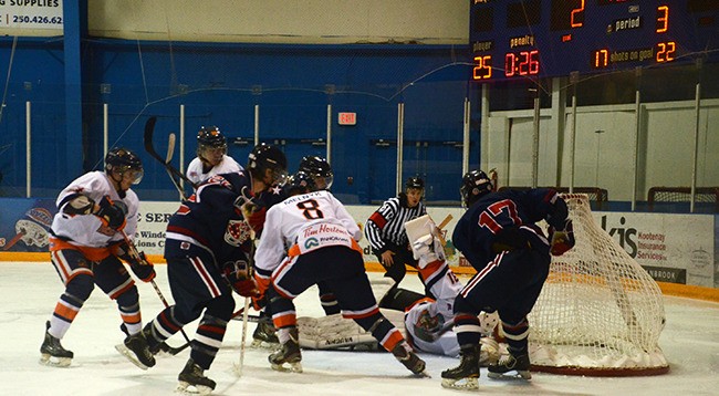 A scramble in front of the Rockies net leads to a goal against from the Spokane Braves on Sunday