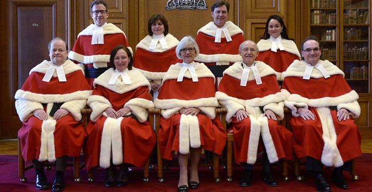 Chief Justice Beverley McLachlin (centre) and the Supreme Court of Canada