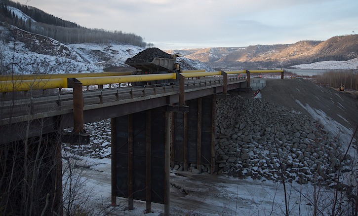 Haul truck crosses temporary bridge at Site C dam project