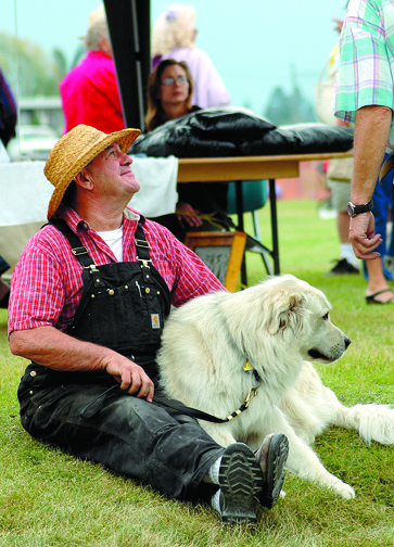 Two fair-goers take in the sights and sounds in 2010.