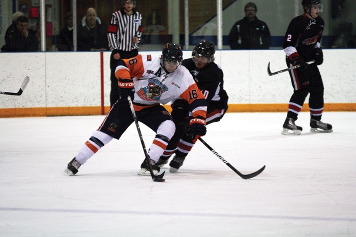 Rockies forward Todd Sykes attempts to get past a defender during the Rockies 4-3 loss to Chase January 20.