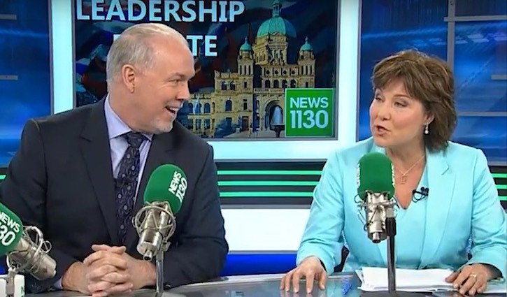 NDP leader John Horgan aggressively interrupts B.C. Liberal leader Christy Clark in their first broadcast debate April 20.