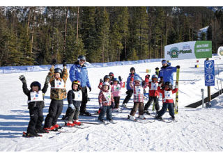 (top picture) Students and instructors of the Snow Birds get ready for their first pass down the new Snow Planet at Fairmont Hot Springs Resort. Pictured above is Ski Operations manager Peter Harding sitting at the top of the new terrain park at the  resort.           Darryl Crane/Echo Photo