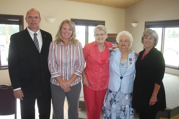 Kootenay Columbia MP David Wilks  presented the Queen's Diamond Jubilee Medal to Windermere resident Anne Picton (center) and Radium resident Phyllis Jackson (center right) at a ceremony on August 24.