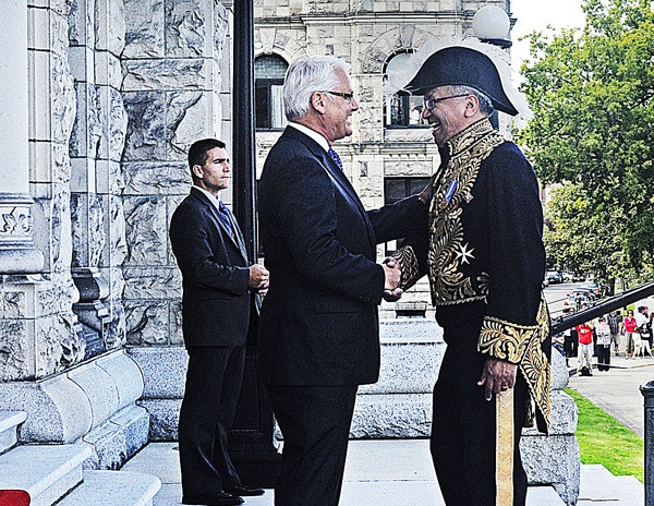 Former premier Gordon Campbell greets Lt.-Governor Steven Point at the opening of the B.C. legislature session in 2009. Point will present the Order of B.C. to Campbell and 13 other recipients on Oct. 4.