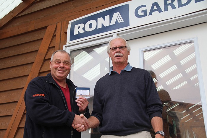 RONA North Star Hardware & Building Supplies manager Leo Bukovnik congratulates Invermere resident Ray Brydon.