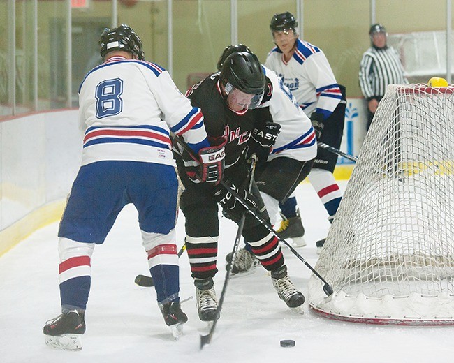 The death Tuesday of 69-year-old Canadian actor Alan Thicke while he was playing hockey in Los Angeles has raised some debate about the suitability of the sport for the senior set. Above is action this year from a Parksville Panters game