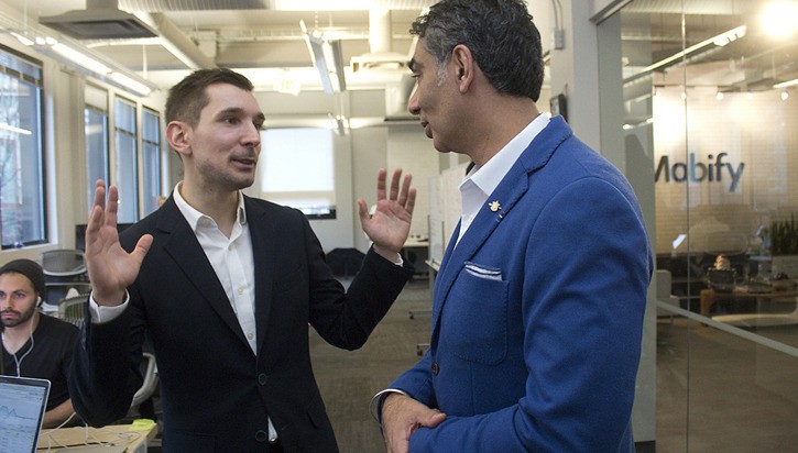 Mobify CEO Igor Faletsky gives B.C. technology minister Amrik Virk a tour of his mobile marketing company's Vancouver office.