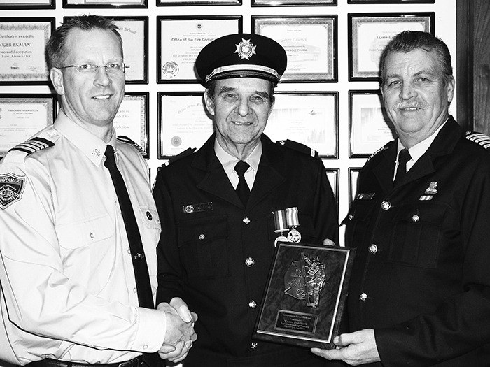 November 2003 — Retiring Invermere Fire Rescue member Nester Fodchuk (middle)