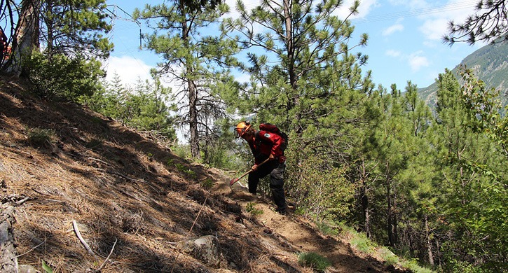 A B.C. Forest Service employee builds a firebreak near the Cisco Road fire near Lytton Tuesday