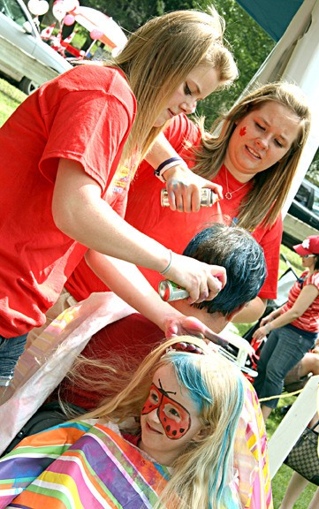 Canada Day brought plenty of partiers to the Mountain Mosaic Festival for activities that ranged from hair spraying and face painting to the Build a Boat races.