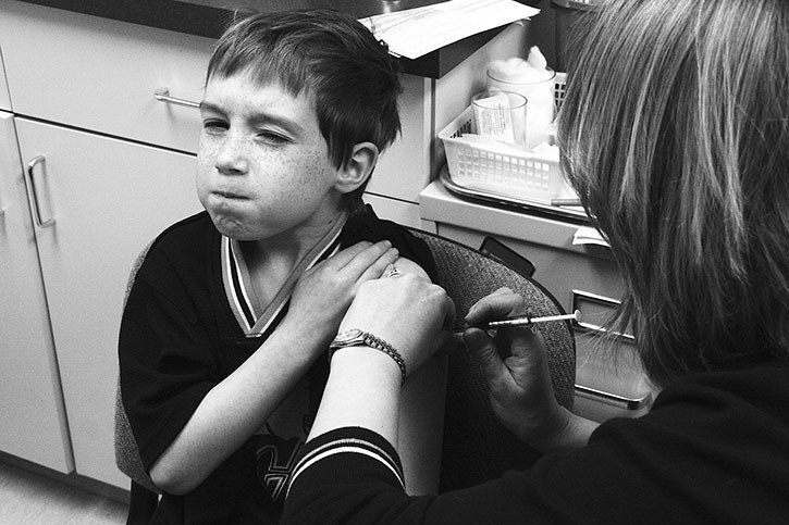 December 2007 — HIT ME WITH YOUR BEST SHOT: Eight-year-old Alex Sinclair was on the receiving end of a flu shot at the Invermere Public Health Unit on November 29th