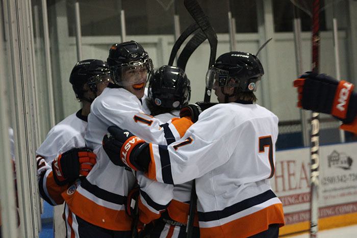 The Rockies celebrate after a second period goal by Ryan Henderson to make the score 4-1.