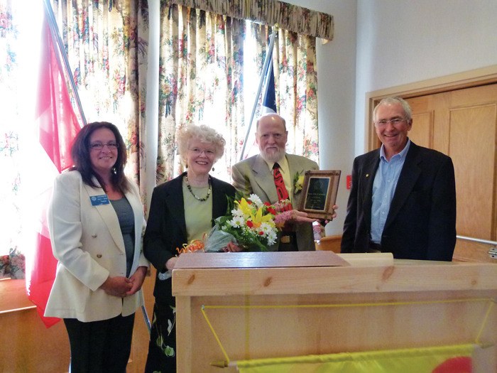 2012 Rotary Citizen of the Year Chris Evans with his award at a luncheon on Thursday (May 10). With him are (l-r) Kerri-Anne Thomas