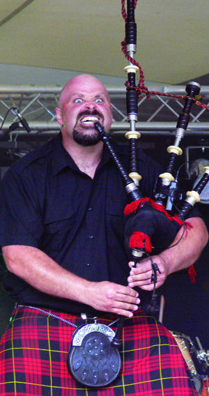 Sandy Campbell of the Mudmen lets his intensity show during the band’s performance at Hoodstock 2009.