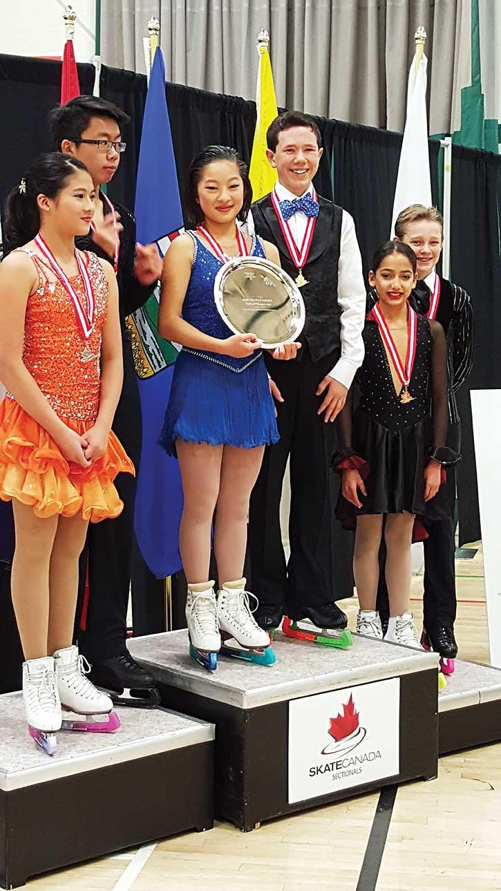 Former Columbia Valley resident Cael Elford  along with his ice dance partner Pearl Kang (centre podium) recently scored the best mark at the Skate Canada Alberta/NWT/NUNAVUT championship