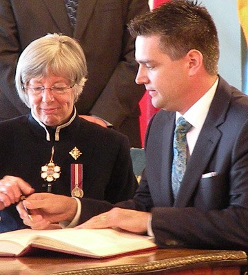 Transportation Minister Todd Stone takes oath of office from Lieutenant-Governor Judith Guichon.