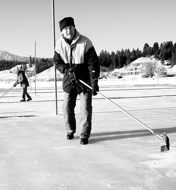 January 2007 — Beattie Ledingham was one of several volunteers who braved the coldest temperatures of winter 2007 and worked with head icemaker Fred Christensen in January to create the sheets of ice and event area for the 25th annual Bonspiel-on-the-Lake.
