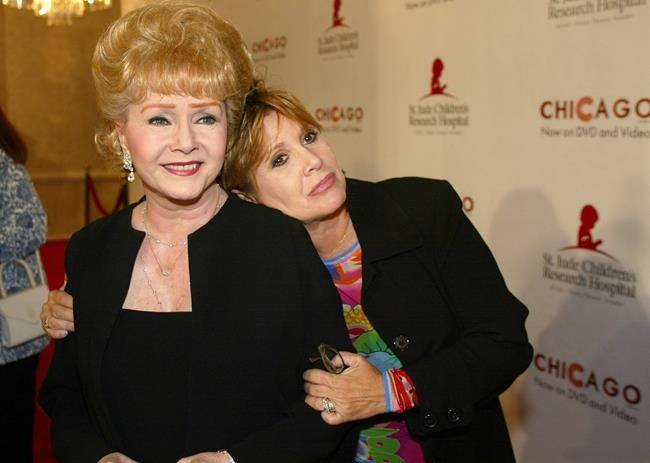 Actress Debbie Reynolds, 84, dies a day after daughter