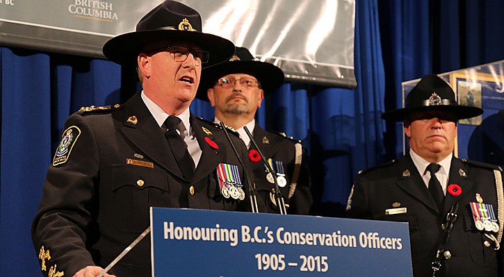 Chief Conservation Officer Doug Forsdick presents service awards at the B.C. legislature Nov. 4.