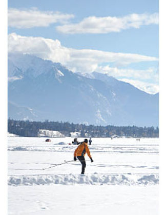 A skier takes advantage of a beautiful day on the frozen water of Lake Windermere.  Darryl Crane/echo photo