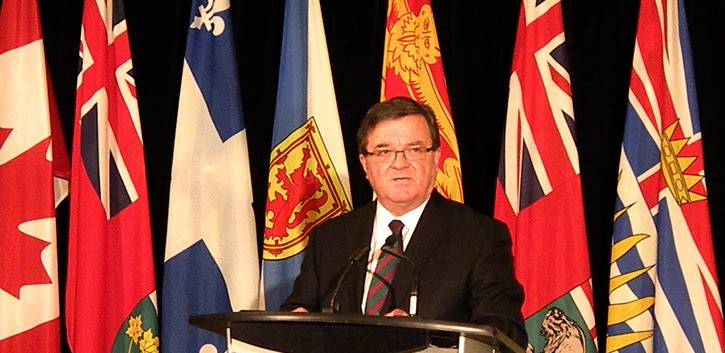 Conservative finance minister Jim Flaherty announces new formula for federal health transfers at finance ministers' meeting in Victoria