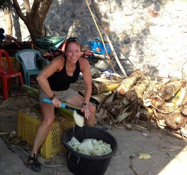 Rossland nurse practitioner Patrice Gordon chops food for a rescued elephant while serving with the Red Cross in Sierra Leone.