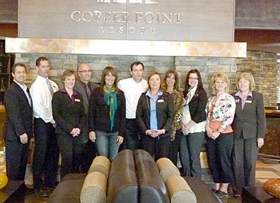 Staff stand proud at the soft opening of Copper Point resort.