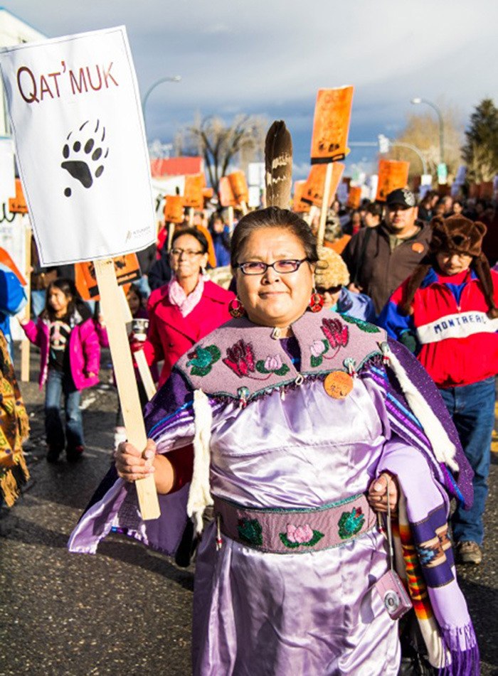 Ktunaxa Nation Council member Margaret Teneese marches with between 300 and 400 people down 10th Ave S in Cranbrook on November 30.