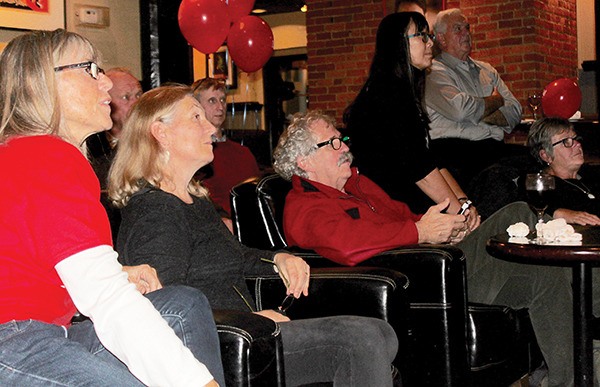 Liberal candidate Don Johnston watches the results roll in with supporters in Nelson on Ocotober 19th.