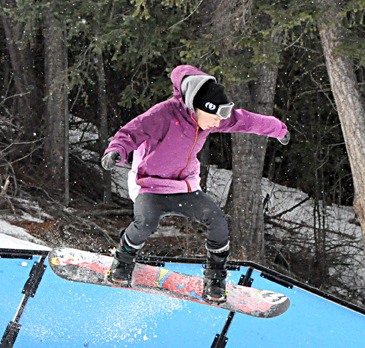 A snowboarder taking part in 2010's Easy Rider Cup at Panorama Mountain Village.