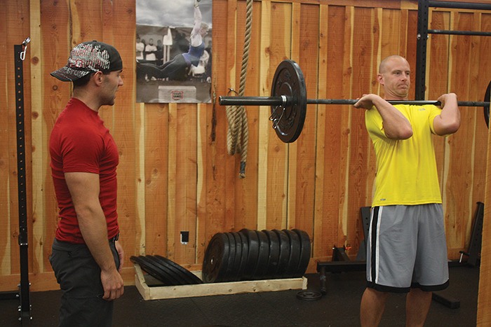 Endeavour Fitness owner Brandon Bloom (left) feels like the group atmosphere of his classes adds to the overall experience.