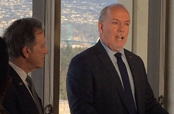 Leader John Horgan and environment critic George Heyman announce the B.C. NDP's plan to modify the carbon tax Thursday.