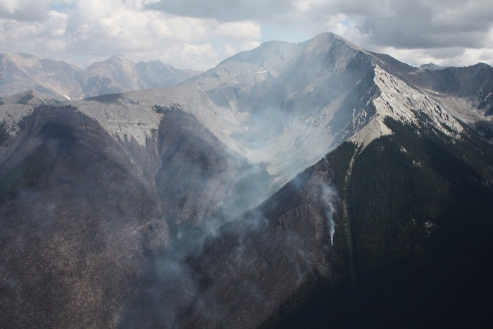 Much of the mountain is engulfed in smoke