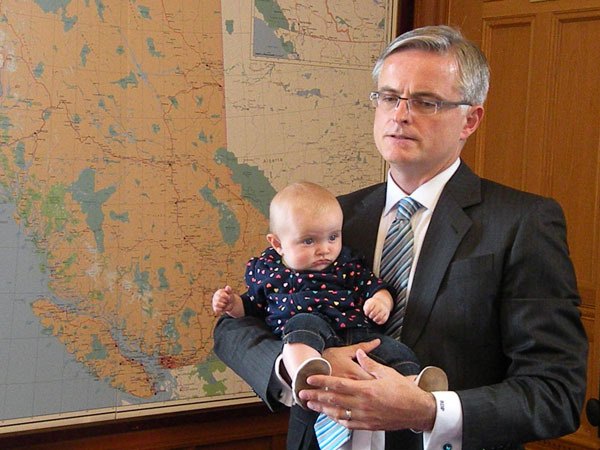 Chilliwack-Hope MLA Barry Penner holds his daughter Fintry