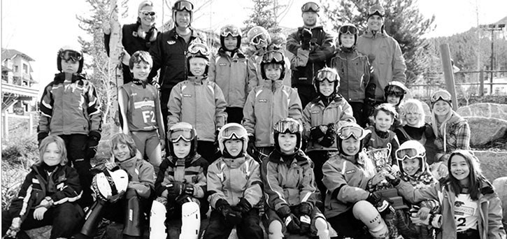 2010 — Members and coaches of the Panorama ski team pose with the trophy for the Alberta provincial championships